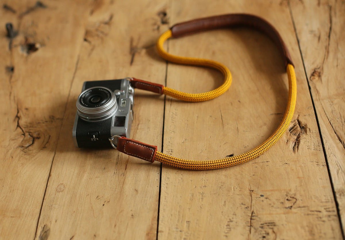 Gold climbing rope camera strap with leather shoulder pad