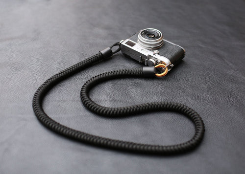 Black and gold woven camera strap